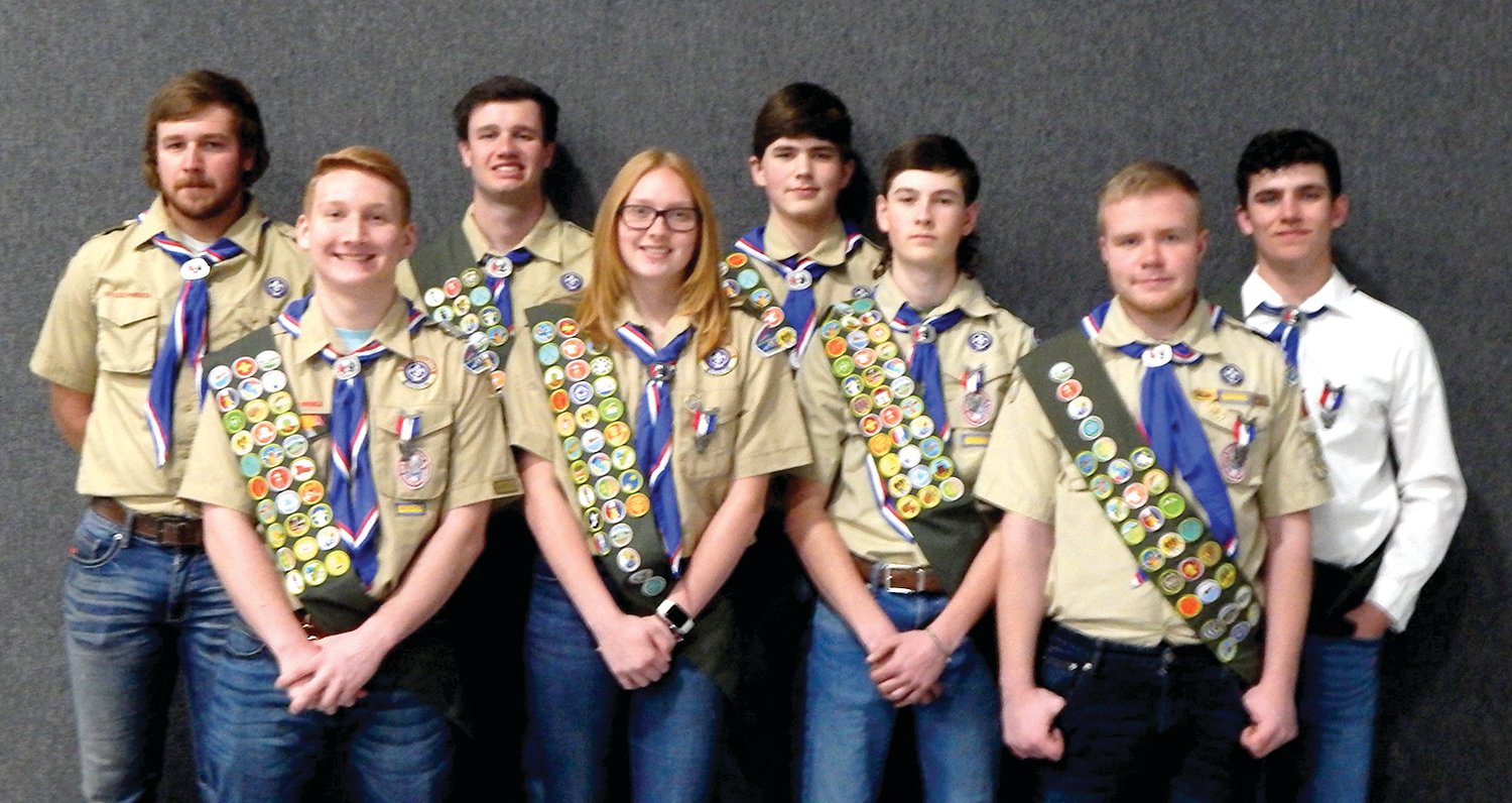 Earning Eagle Scout at Loose Creek Troop #76 are, from left to right, front row, Jace Bax, Samantha Bax, Hayden Hoffman, and Jaxon Riegel; and in the back row, Mathew Borgmeyer, Paul Boeckmann, Adam Thoenen, and Daniel Kleffner. Not pictured is Joseph Schwartz.